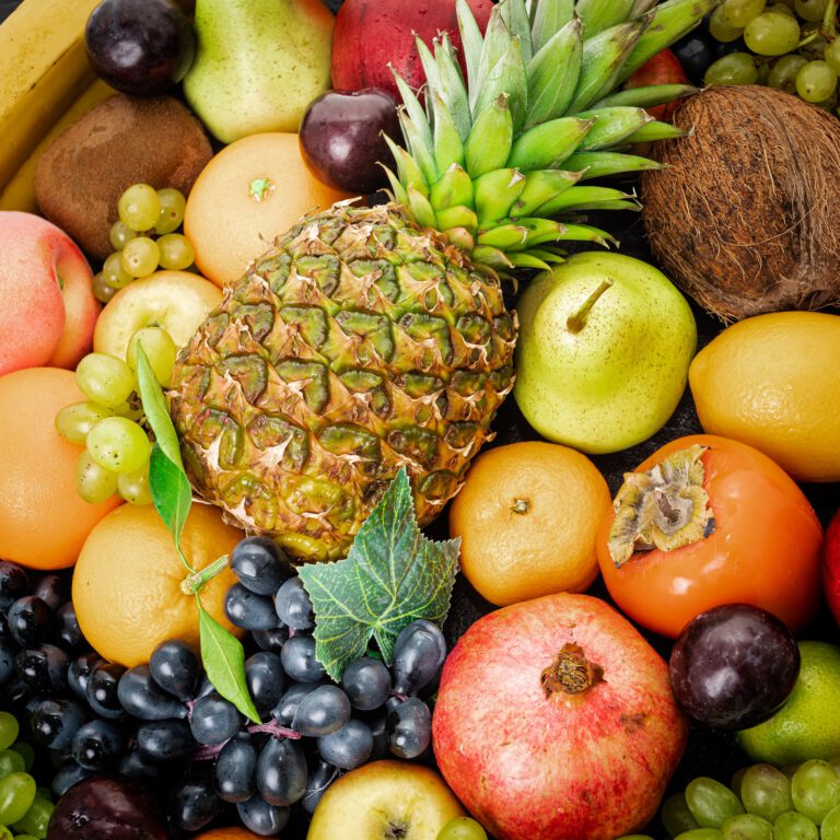 Assortment of healthy raw fruits. Mixed fruits.